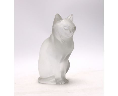 A Lalique glass seated cat, signed to the base, 20cm high Series of brown scuffs to cat’s right eye area and to the arch of h