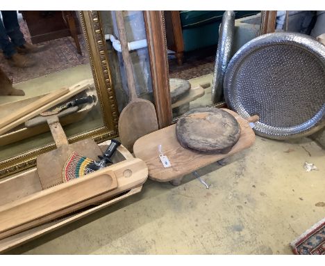 A 19th century fruitwood trough, a provincial bread paddle, two provincial stools, etc