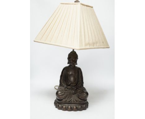 A bronzed Buddha table lamp, 57cm high including shade