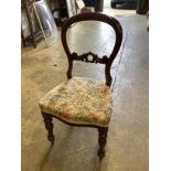 A harlequin set of six Victorian mahogany balloon back dining chairs