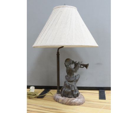 A bronzed metal monkey trumpet playing table lamp, approx. 70cm high including shade