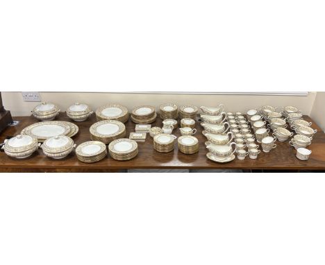 An extensive Wedgwood Gold Florentine dinner service, consisting:- 26 dinner plates, 50 side plates, 18 soup bowls with 16 sa