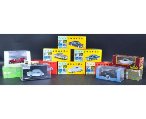 A collection of x12 assorted diecast model cars by makers Lledo Vanguards, Oxford Diecast, Rio, Vitesse and Solido. Examples 