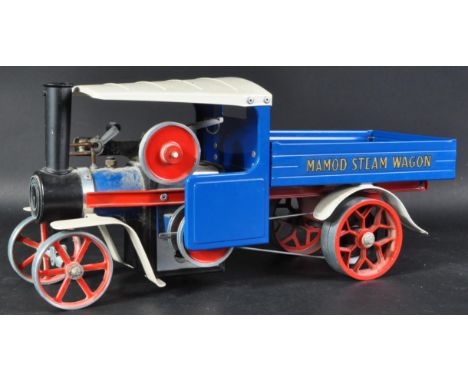 An original vintage Mamod live steam engine model No. SW1 Steam Wagon. A solid fuel example with blue bodywork and red spoked