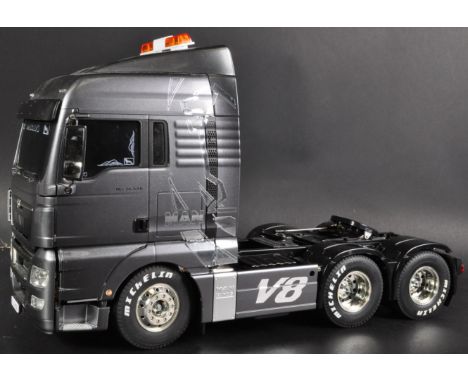 A highly detailed Tamiya 1/14 scale RC Radio Control scratch built model kit No. 56325 MAN TGX 26. 540 6X4 XLX Tractor Truck.