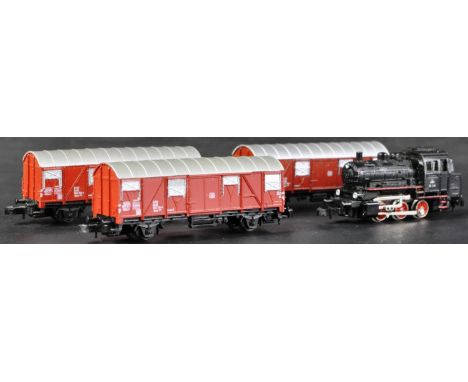 An original vintage Marklin made Z gauge model railway trainset locomotive engine No. 8800 tank loco with x3 coach / carriage