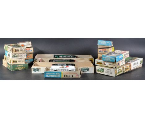 A large collection of assorted vintage Airfix 00 gauge model railway trainset locomotive kits and rolling stock wagons. Examp