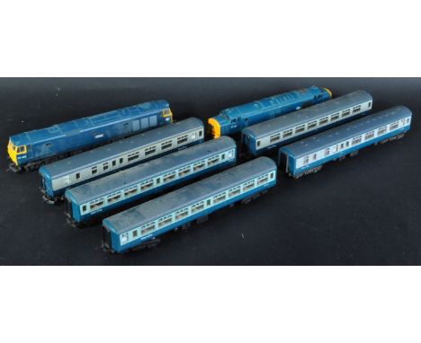 A collection of assorted Hornby and Lima 00 gauge model railway trainset locomotives and coaches / carriages. Diesel locos co