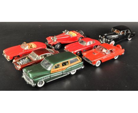 A collection of x7 assorted 1/24 scale Franklin Mint and Danbury Mint diecast model cars to include; 1954 Mercedes-Benz 300SL