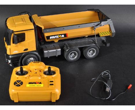 A highly detailed Huina made 1/14 scale RC Radio Control Hopper Truck / Dump truck with light, sounds, full wheel operation a