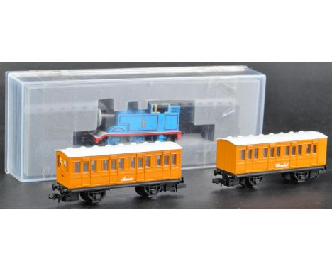An original vintage Tomy / Tomix made ' Thomas and Friends ' N gauge model railway trainset tank locomotive with Annie and Cl