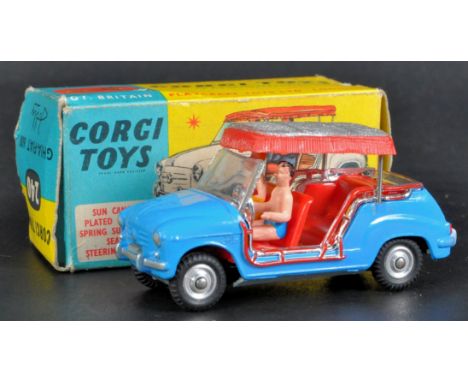 An original vintage Corgi Toys boxed diecast model No. 240 Ghia-Fiat 600. The car with sun canopy and driver / passenger figu