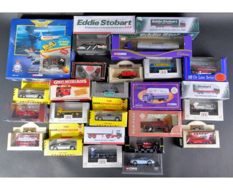 A large collection of assorted boxed diecast model cars and other vehicles of various scales and makers. Examples to include;