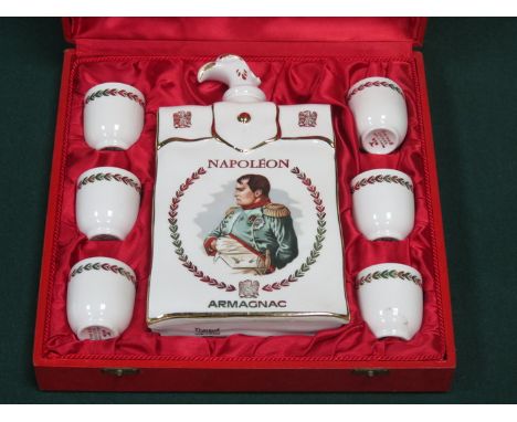 CASED CERAMIC LIMOGES DECANTERS WITH MEASURES DEPICTING NAPOLEON 