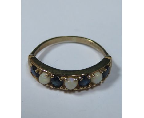 9ct GOLD DRESS RING SET WITH SMALL SAPPHIRE AND OPAL COLOURED STONES 