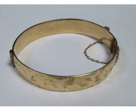 GOLD COLOURED SNAP BANGLE 