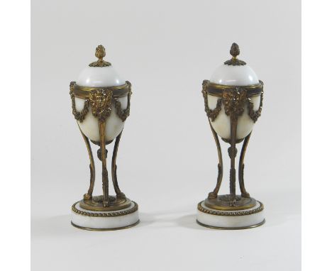 A pair of early 19th century style ormolu and marble cassolettes, the lid lifting to reveal a candlestick, 22cm high
