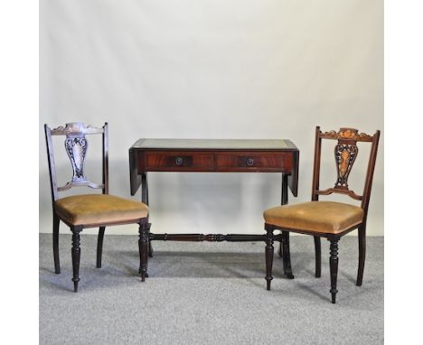 A reproduction mahogany sofa table with a green leather inset top, 145cm overall, together with a pair of Edwardian inlaid si