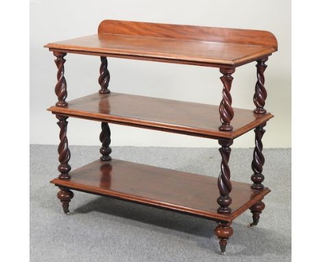 A Victorian mahogany three tier buffet, on barley twist supports, 114cm