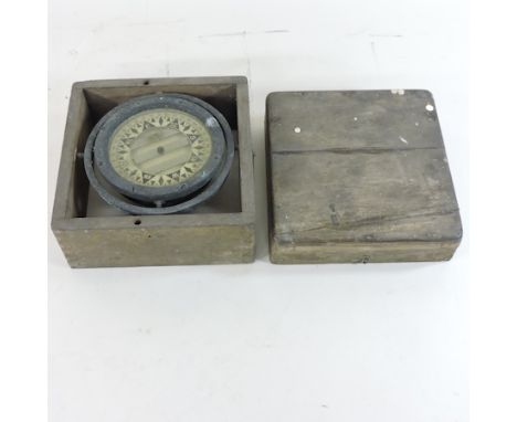 A mid 20th century marine compass, in a wooden case