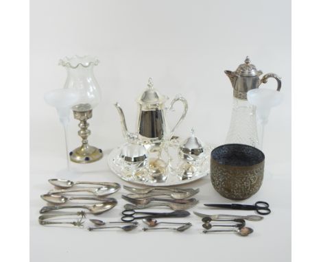 A shelf of silver plated items and glassware, to include a claret jug