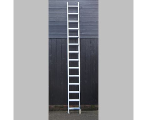 An aluminium extending ladder, approximately 700cm high