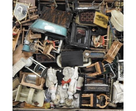 A box of vintage doll's house furniture