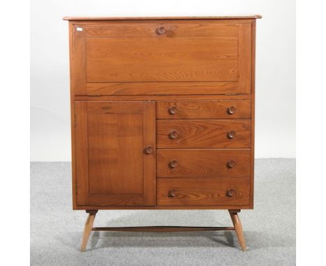 An Ercol light elm cocktail cabinet, 93cm