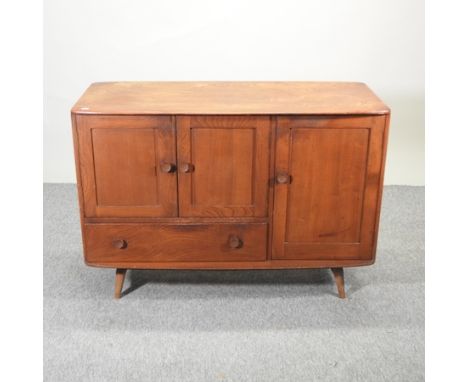 A 1970's Ercol elm sideboard, 114cm