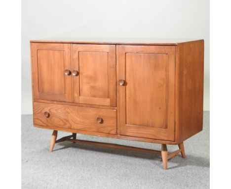 A 1970's Ercol elm sideboard, 104cm