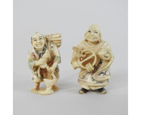 A netsuke, in the form of a man, together with another, 5.5cm high