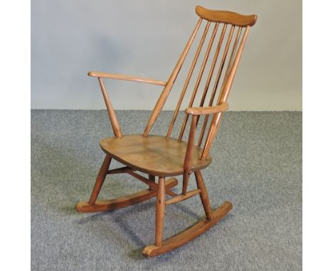 A 1970's Ercol light elm rocking chair