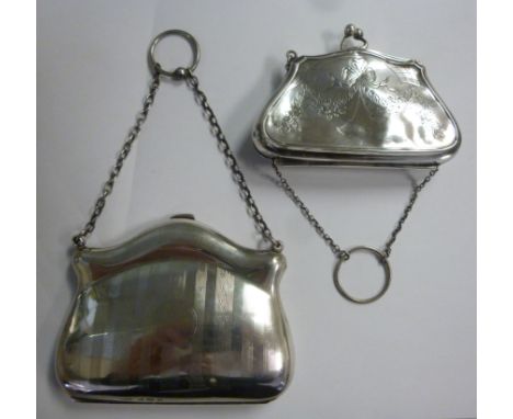 A silver pigskin lined and fitted purse, in the style of a lady's handbag with engine turned decoration, on a button clasp an