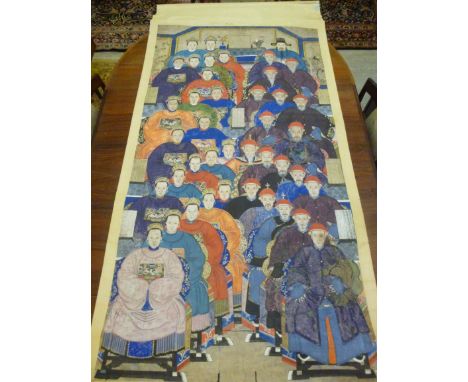 A 19thC Chinese scroll painting on paper, featuring two ancestral group portraits, one, a family of twenty-two, the other of 