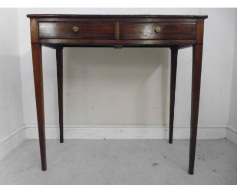 A mid 19thC mahogany side table, the top having a crossbanded border and edge, over two in-line frieze drawers with brass but