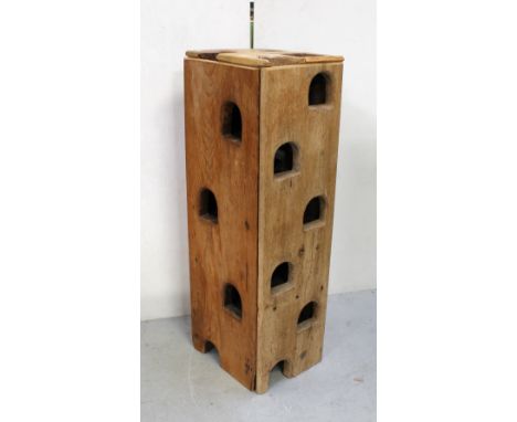 Two vintage yacht ladders converted into a wine rack, 132 x 39cm.
