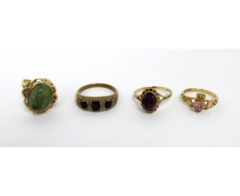 Four 9ct gold ladies' dress rings; one set with amethyst-coloured stone, size N, one set with blue and white stones, size N, 