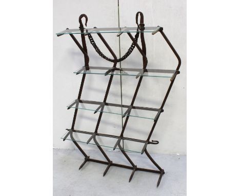 A vintage harrow, converted to form a set of shelves, width 138cm.