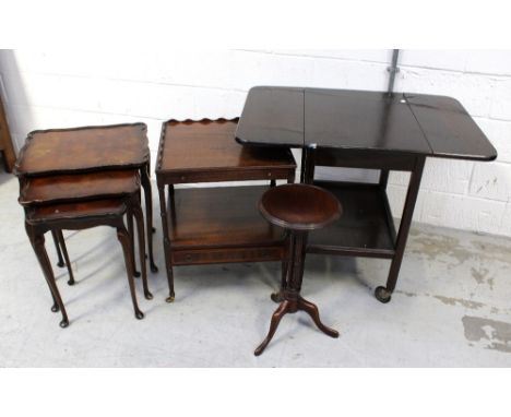 A nest of three walnut tables on cabriole supports to pad feet, a mahogany two-tier side table, pull-out drinks shelf over on