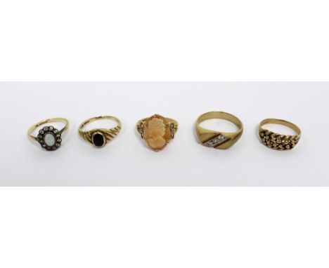 A 9ct gold gentlemen's dress ring, platform-set with three small white stones, size V and four 9ct gold ladies' dress rings; 