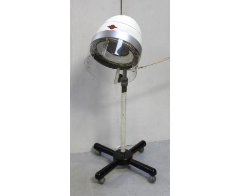 A vintage Charles Alexander 'Supercharger' hairdryer, converted to a lamp.