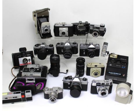Approximately twenty cameras to include a cased Polaroid Land Camera 80A, a Agfa Isola 1, a Lomo 135BC etc.