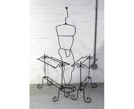 A pair of black wrought iron decorative towel rails and a decorative wrought iron mannequin, height 190cm (3).