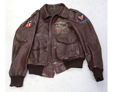 A reproduction type A-2 U.S Army Air Corps style flight jacket, applied badges to sleeves and painted images to reverse and f