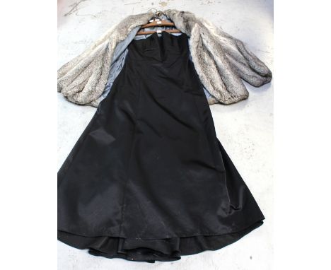 A black satin strapless evening gown and a vintage grey fur jacket with roll collar (2).