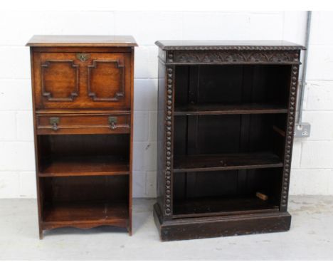 An oak stained Gothic-style bookcase, two shelves on plinth base, length 73cm and a similar style oak bureau of small proport