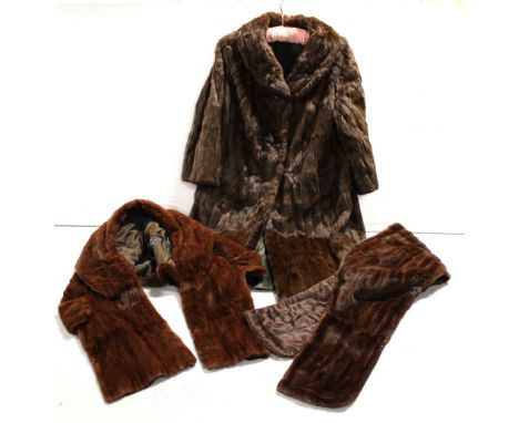 Two mid-20th century vintage musquash fur coats and an evening wrap (3).