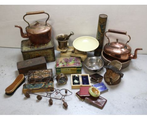 Mixed metalware to include a bronze pestle and mortar, two large Victorian copper kettles, vintage tins etc.