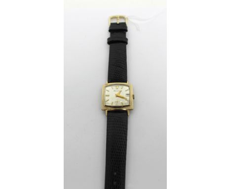 Bulova; a 1966 gentlemen's 'Date King' tank-style wristwatch, gold filled cushion case with decorative bezel, white satin eng