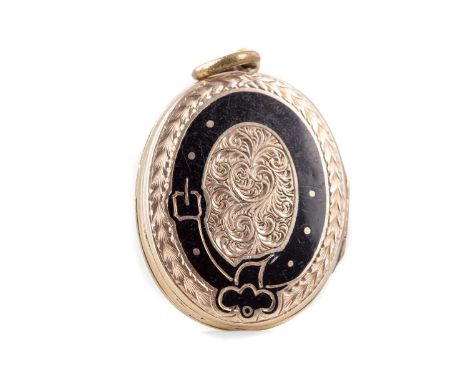 VICTORIAN MOURNING LOCKET,the front with 'IN MEMORY OF' within ribbon and enamelled garter to the reverse, yellow metalHeavil